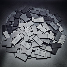 Load image into Gallery viewer, 50x25mm Rectangular Plain Plastic Bases - ModelBricks